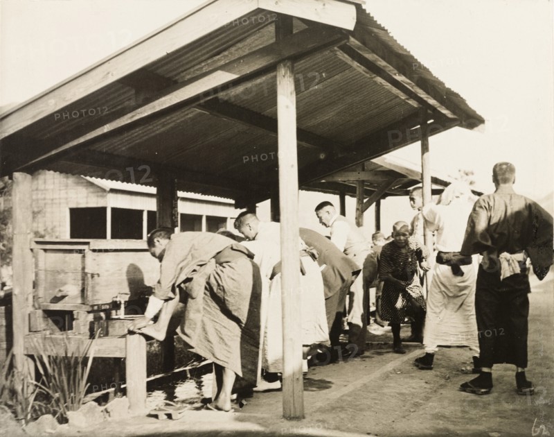 Freshening up at railway station in Manchuria