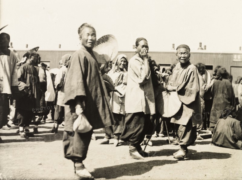 Women with bound feet on station