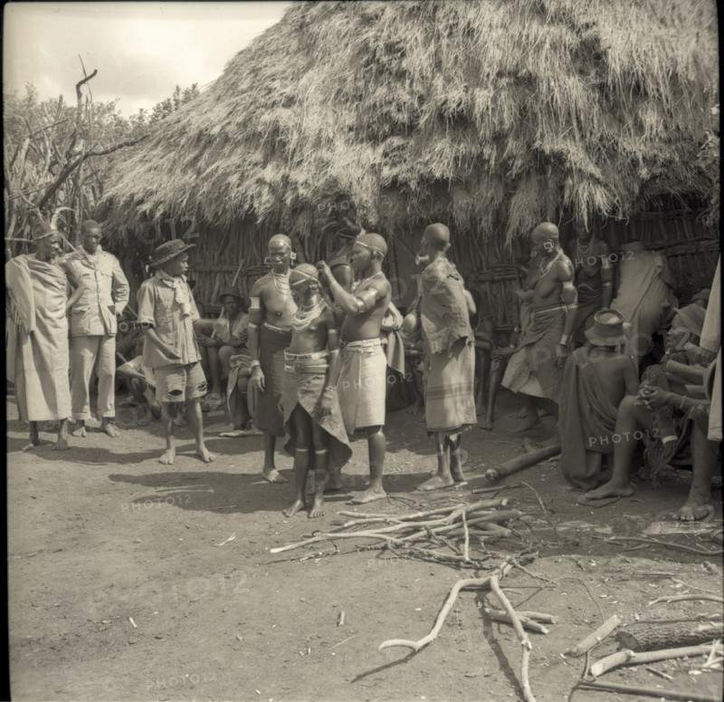 Placing the axe on the head of girl