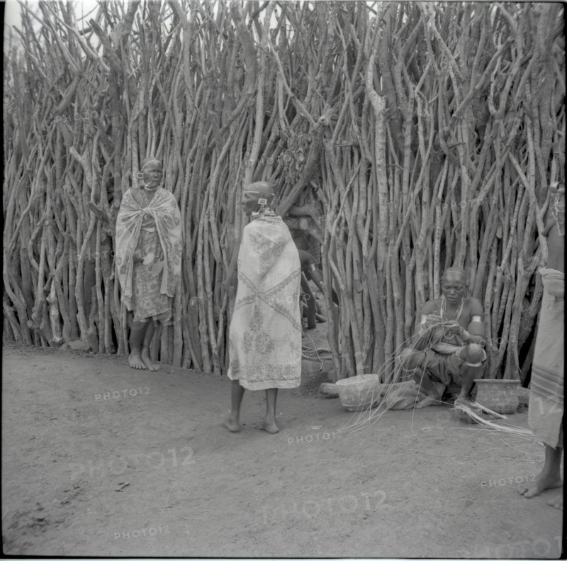 Sisters outside cattle gateway
