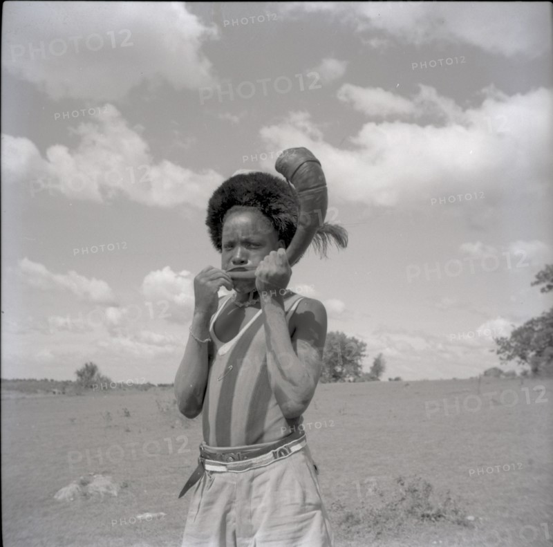 Youth with horn