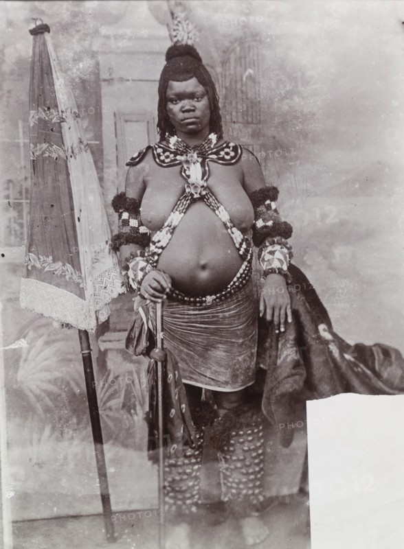 Portrait photograph of an African bride in traditional dress