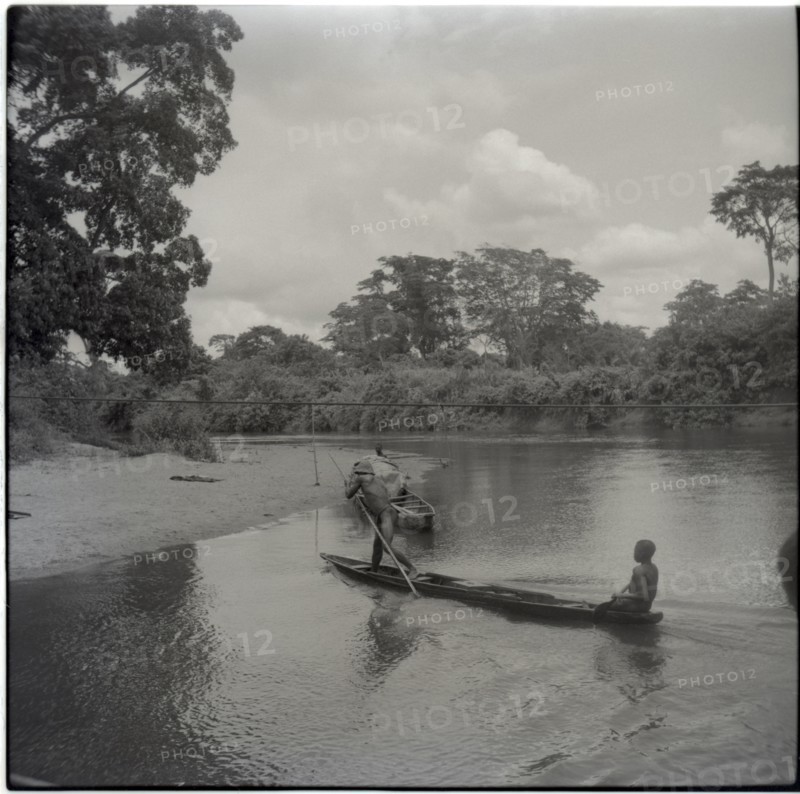 Journey from Ibadan to Cameroons, second ferry on Ikom road, canoe fisherman