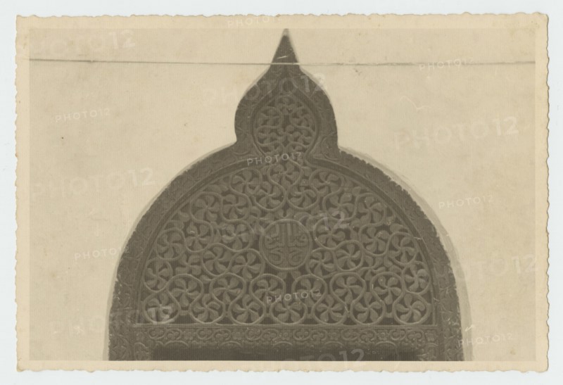Top portion of ornately carved doorway