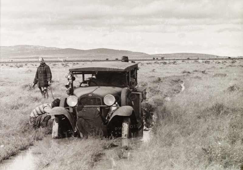 Car stuck in flooded plains