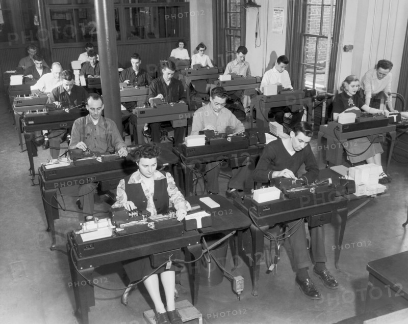 Workers Using Data Punch Cards