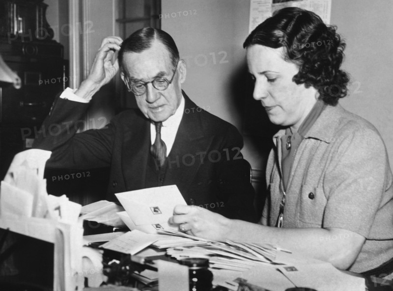 Man Assisted By His Secretary