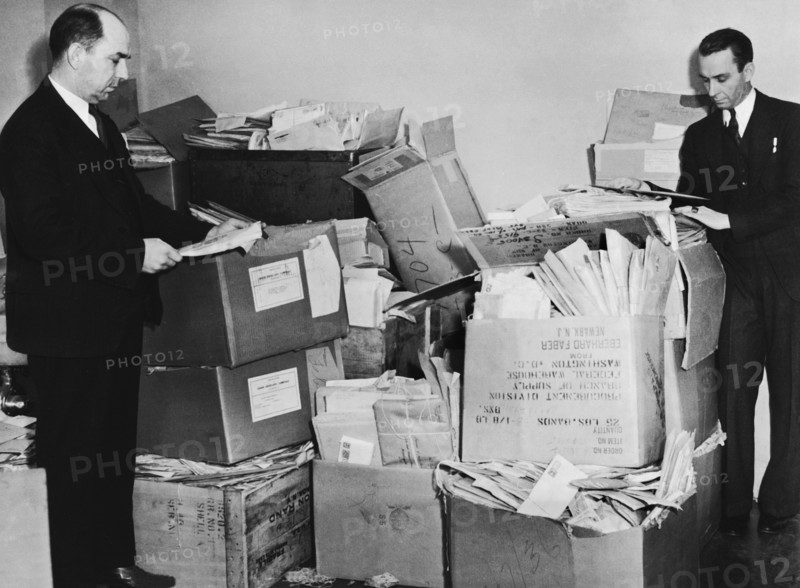 Men With Piles Of Mail