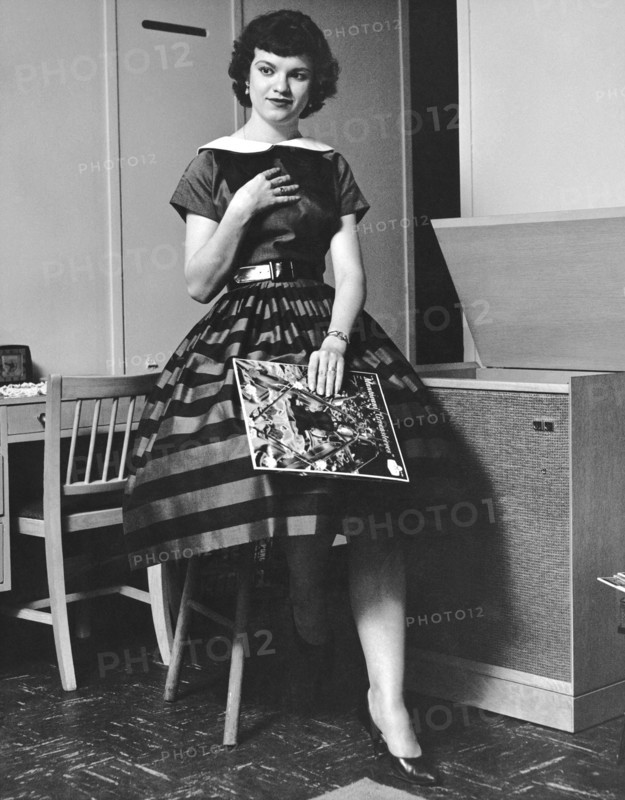 A Woman Listening To Records