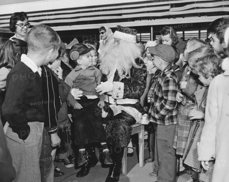 Santa Surrounded By Children