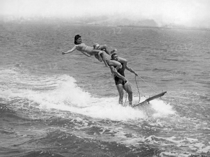 San Diego Bay, California  c. 1926  
This triple stack was doomed when the top passenger lost her balance while riding on an aquaplane.