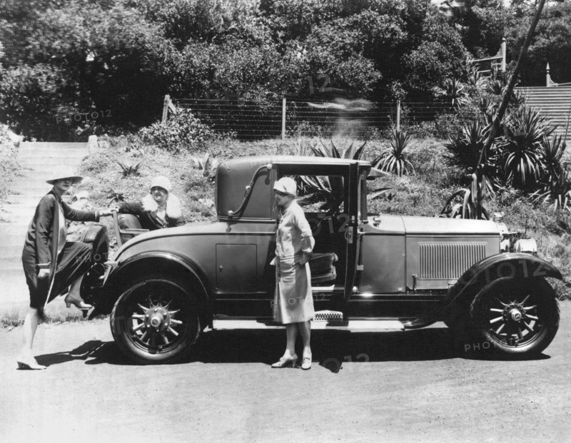 Climbing Into A Rumble Seat