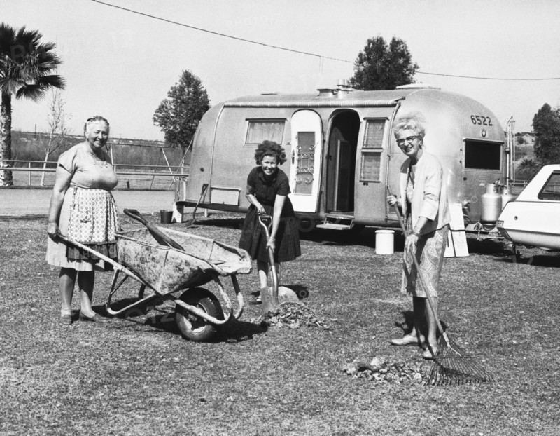 Women Cleaning Rodeo Grounds