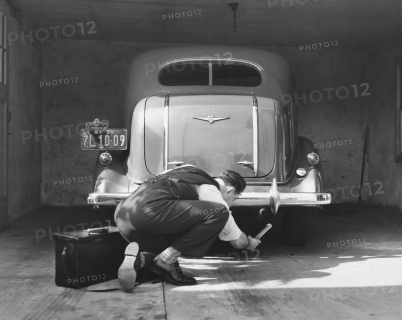 Man Working On HIs Car