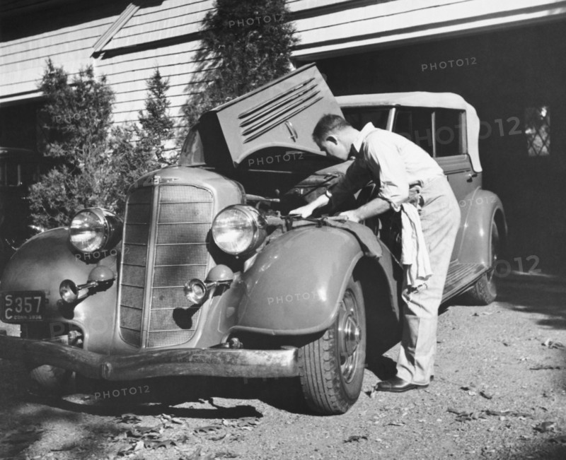 Man Working On HIs Car