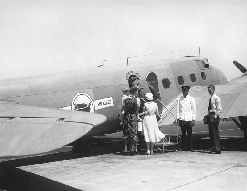 Passengers Boarding Airplane