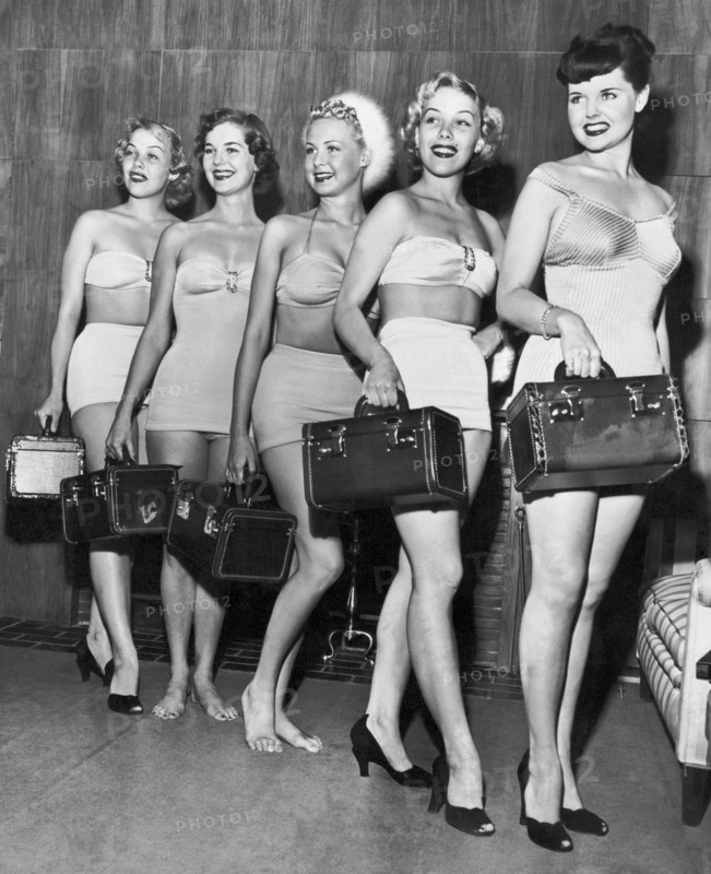 Five Women Pose With Bags