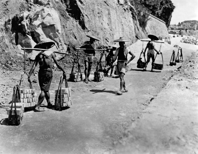 Coolies Carrying Bricks