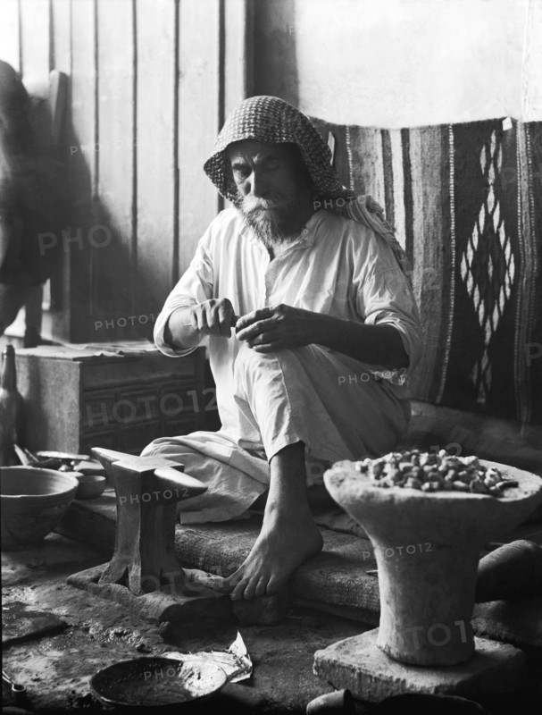 An Iraqi Silversmith At Work