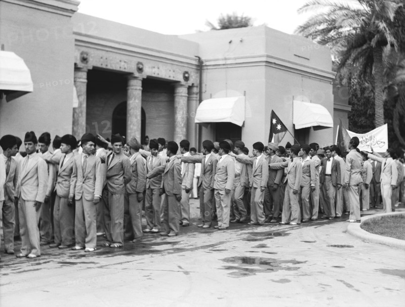 Iraqis Salute King Faisal