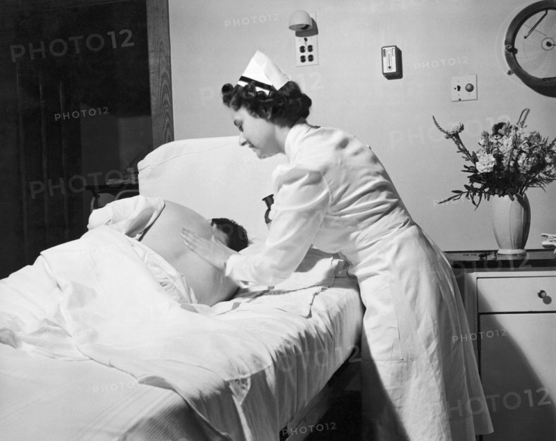 Nurse Gives Patient Rub Down