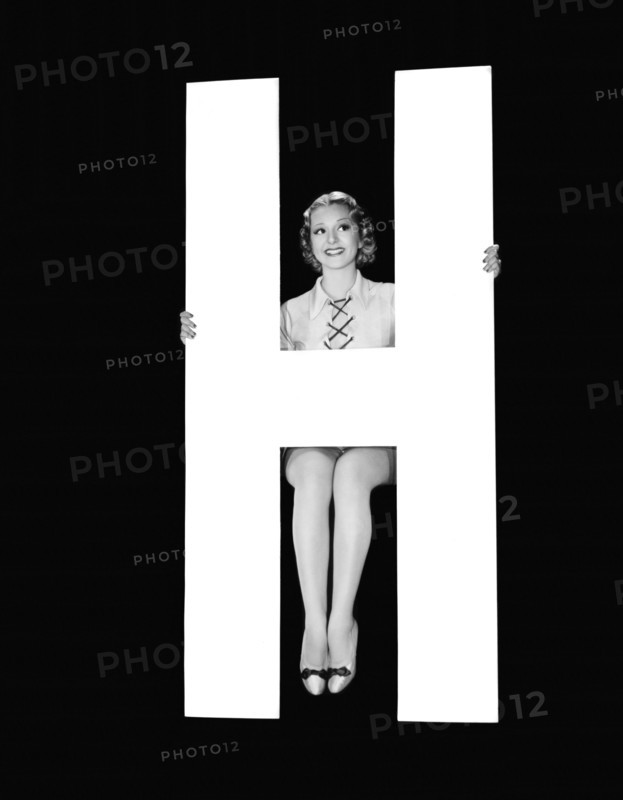 The Letter "H" And A Woman