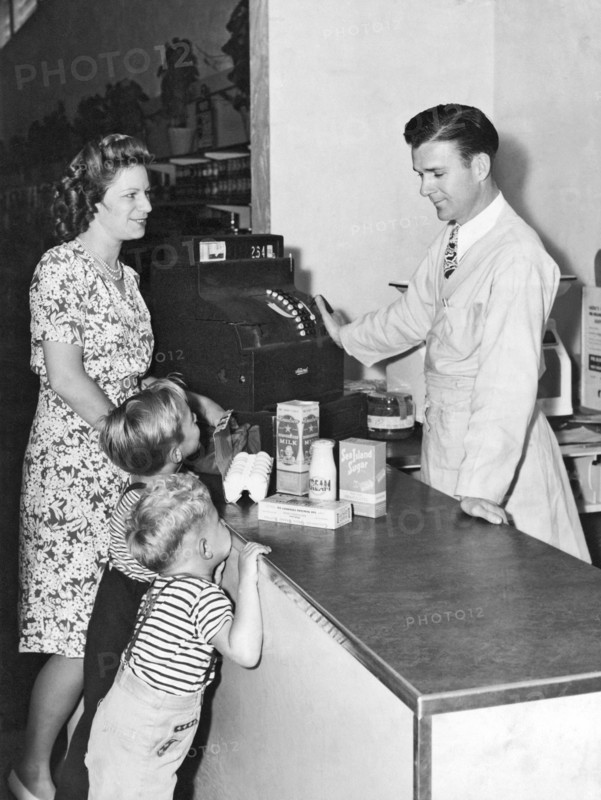 Woman Purchasing Groceries