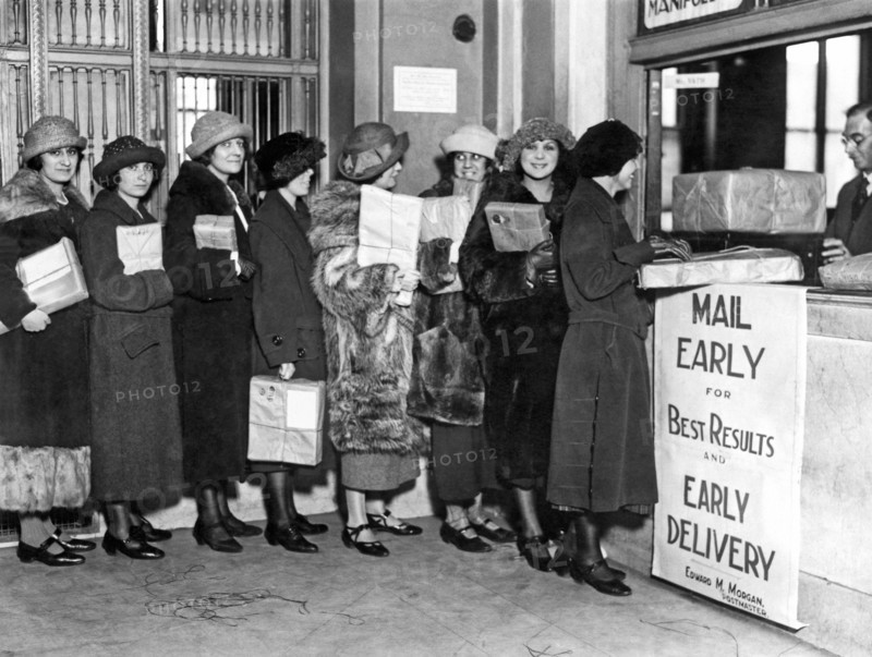 A line of women at the post office mailing their Christmas packa