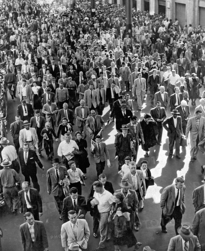 Baseball fans leaving Yankee Stadium.