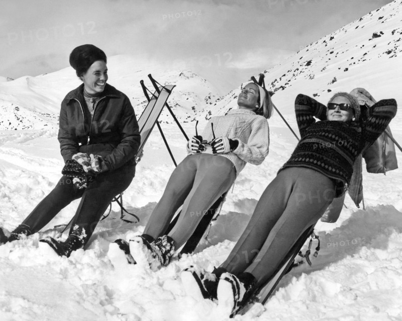 Skiers Basking In The Sun