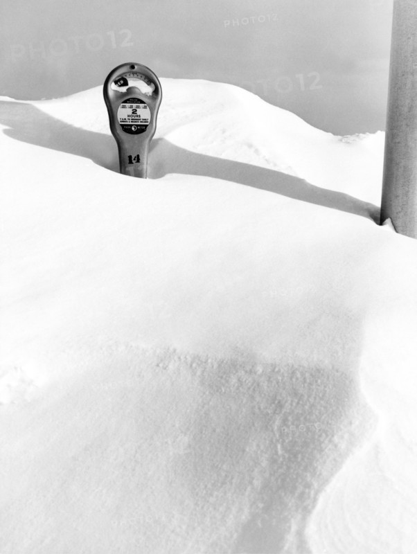 An Expired Parking Meter In The Snow