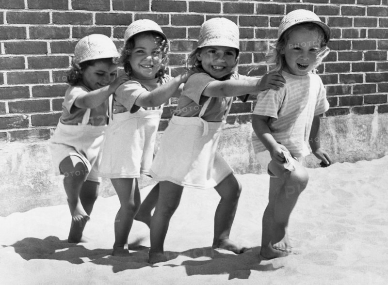 Four Little Girls Having Fun