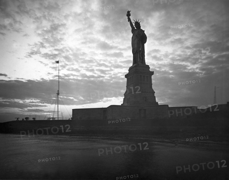 Statue Of Liberty At Sunset