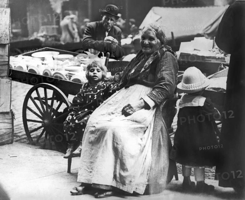 A Family And Their Push Cart