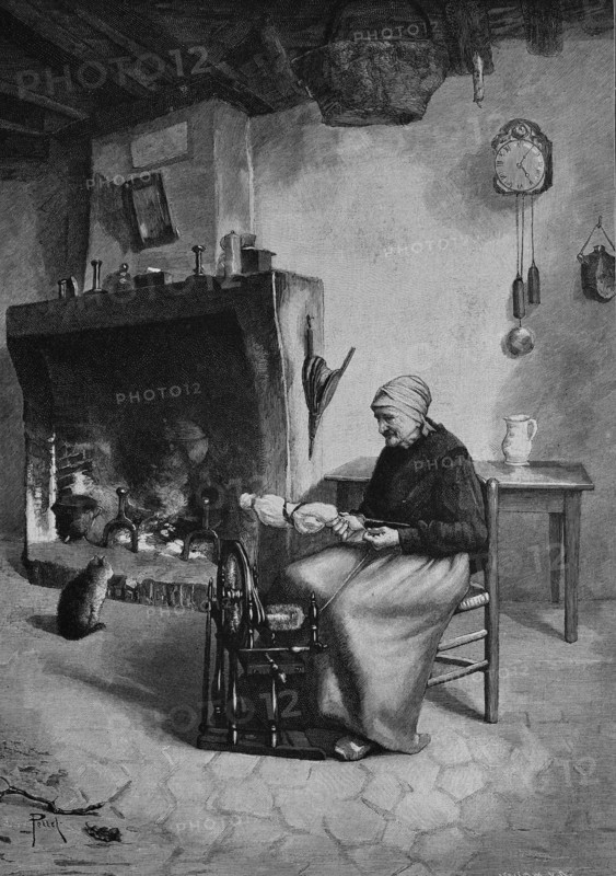 Woman spinning wool