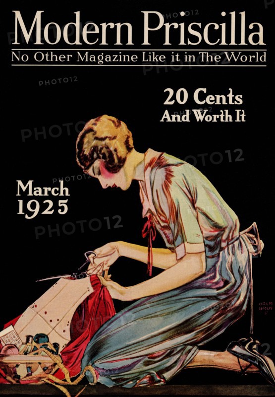 Woman cuts a dress patter with her scissors 1925
