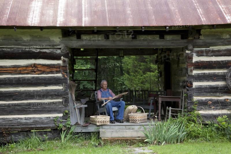 Basket weaver in Log Cabin 2010