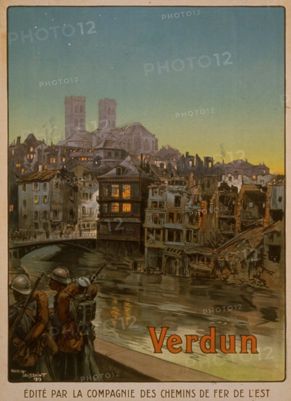 Soldiers marching beside a river and over a bridge into a shelled Verdun. The battle of Verdun in 1916 was the longest and costliest battle -- in terms of lives -- of the war. 1916