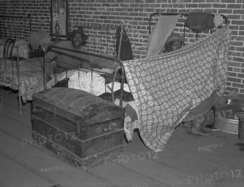 Black flood refugees in the Red Cross temporary infirmary at Forrest City, Arkansas 1936
