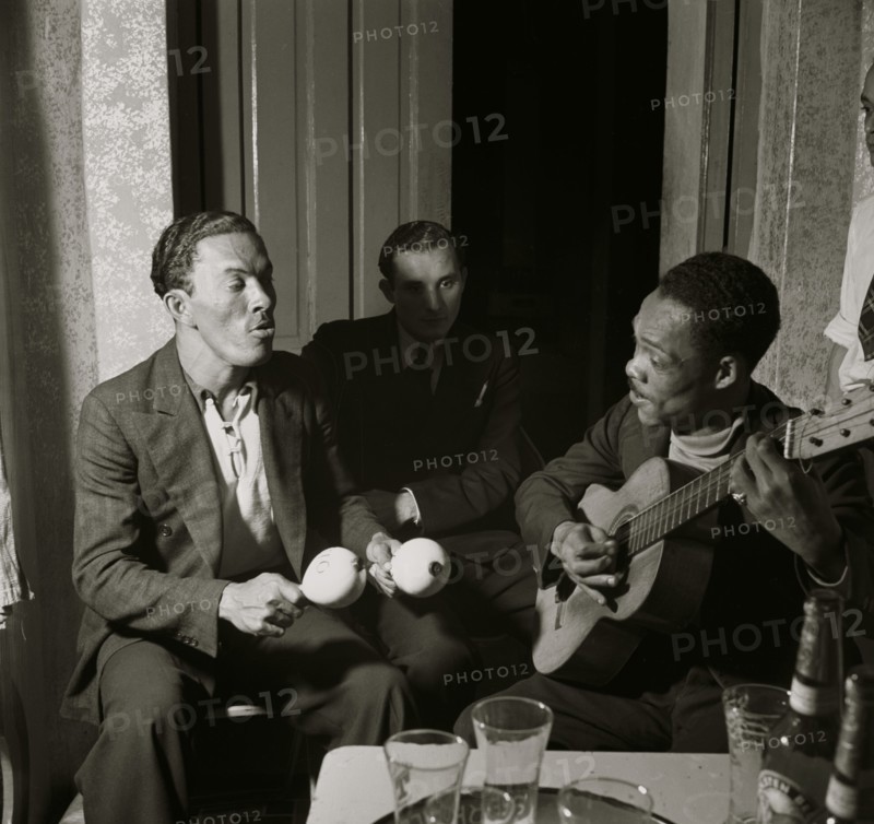 Itinerant musicians in a bar. Rio Piedras, Puerto Rico 1937
