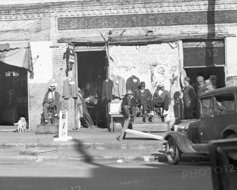 Sidewalk scene in Selma, Alabama 1936