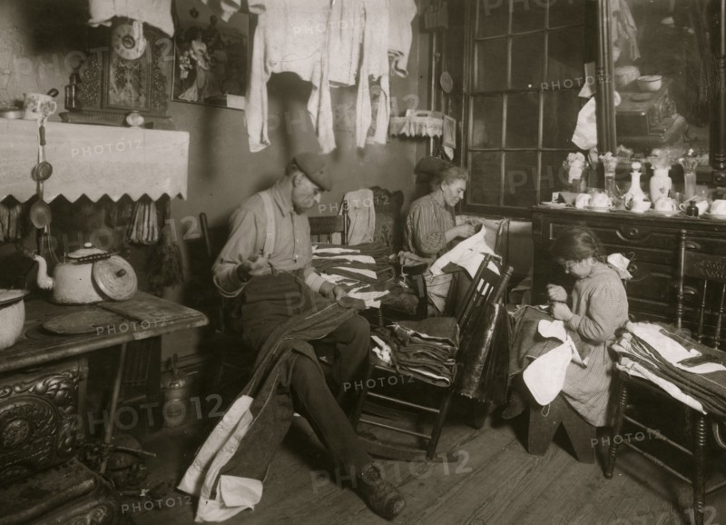 11:30 A.M. Jennie Rizzandi, 9 year old girl, helping mother and father finish garments in a dilapidated tenements, immigrants  1924
