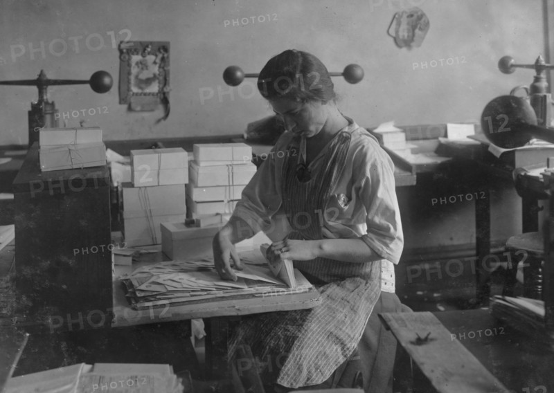 Packing the finished envelopes at Embossing shop.  1917