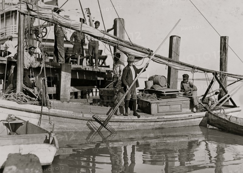 A young oyster fisher Others smaller employed in busy season. Apalachicola, Fla. 1909