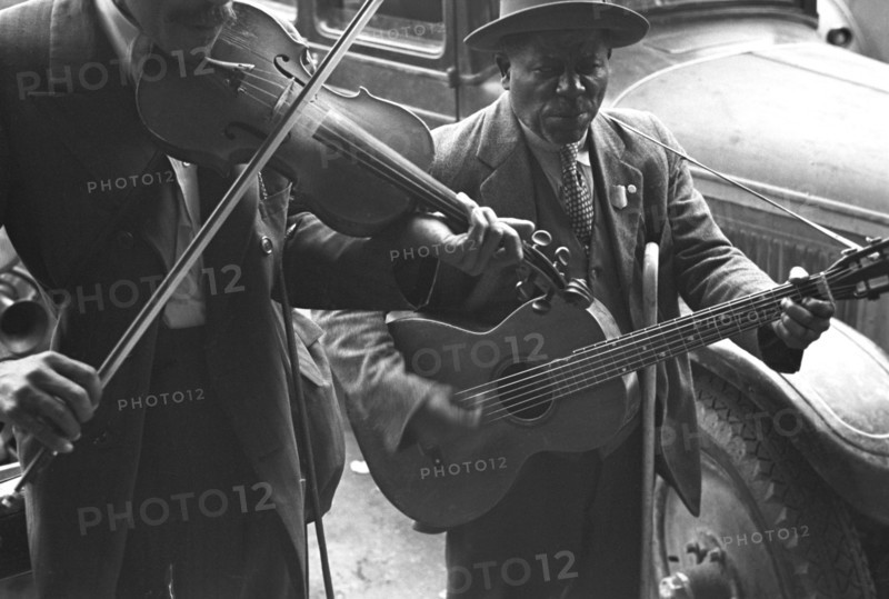 African American musicians play a violin  Guitar 1939