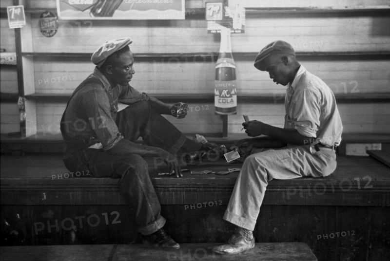 African American Playing cards on a bench 1938