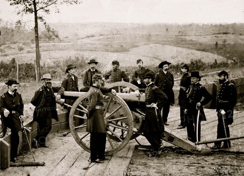 Atlanta, Ga. Gen. William T. Sherman, leaning on breach of gun, and staff at Federal Fort No. 7 1864