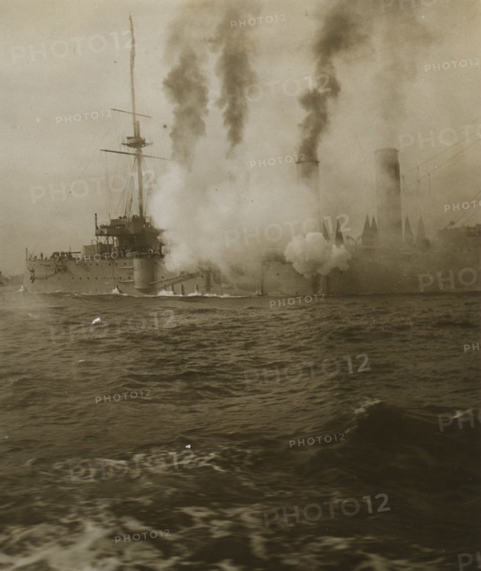 An American cruiser firing its guns in salute  1905