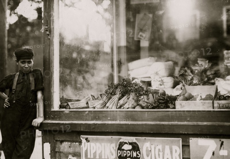 Portuguese immigrant boy works in folding-in room of the Wood Mill. Is an illiterate 1911