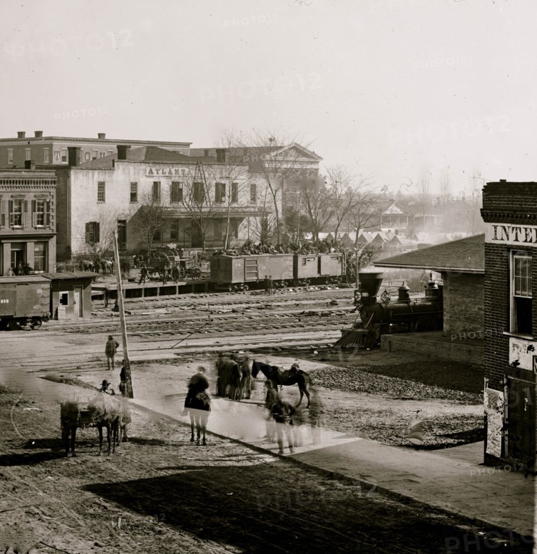 Atlanta, Ga. Soldiers on boxcars at railroad depot 1865